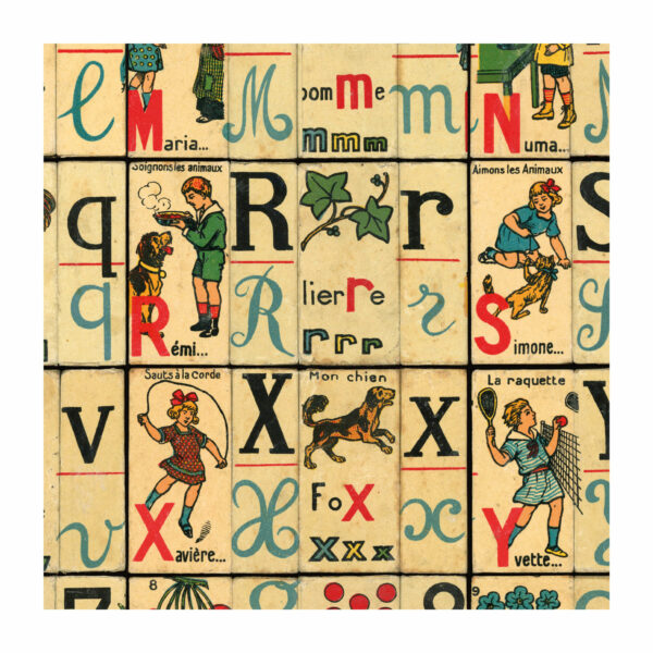 Detail from wrapping paper featuring vintage French children's toy bricks